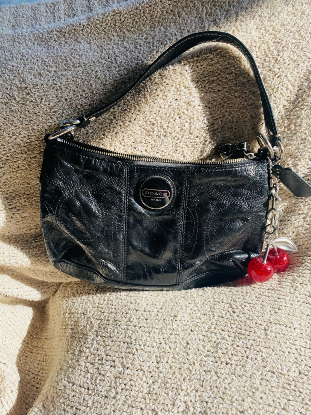 Coach Black Leather Shoulder Bag with Red Cherry Charm